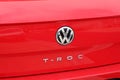 Volkswagen t-roc line compact car red logo brand and text sign Royalty Free Stock Photo