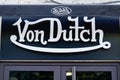 Von dutch boutique brand logo and sign text on facade entrance fashion front store