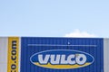 vulco logo brand and sign text front of station garage car tire sales and fitting