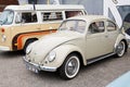 Vw Volkswagen old Beetle ancient vintage car parked front bus westfalia type 2 camper