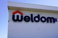 Weldom store French brand of DIY store with facade logo text and sign on shop front