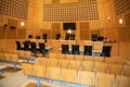 Wooden courtroom interior with offices of the judge of the clerks and the public