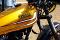 Yamaha motorcycle logo brand and text sign on motorbike golden fuel tank of vintage