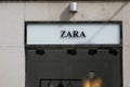 zara logo brand and text sign on wall facade shop entrance in city