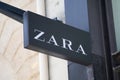 zara logo brand and text sign on wall facade storefront fashion business