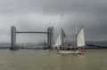 BORDEAUX- THE DEPARTURE OF OLD BOATS AND ITS PASSAGE UNDER THE CHABAN DELMAS BRIDGE Royalty Free Stock Photo