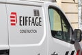Eiffage Construction logo in front of their vehicles in Bordeaux.