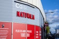 Naturalia logo in front of their local shop in Bordeaux, France.
