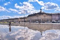 Bordeaux, France - Sep 17, 2021: Water Mirror, the world's largest reflecting pool on the quay of the Garonne river in Royalty Free Stock Photo