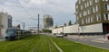 Bordeaux, France, Tram rolling next to La cite du vin, the Wine museum of Bordeaux near to Garonne river