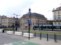 Bordeaux, Gironde France Moving tram next to Place de la Bourse and Le Miroir d`eau Water Mirror in Bordeaux