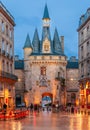 Palace square and Cailhau gate, at night in Bordeaux, Nouvelle-Aquitaine, France Royalty Free Stock Photo