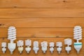 Border of assorted sized spiral light bulbs