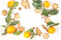 Border of Christmas star cookies with spices and mandarin on white background with copyspace Royalty Free Stock Photo