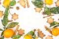 Border of Christmas star cookies with spices and mandarin on white background with copyspace Royalty Free Stock Photo