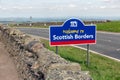 Border between England and Scotland at Carter Bar with signboard Royalty Free Stock Photo