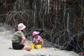 Border Field State Park Beach, CA, USA - July 30, 2023: People near the USA Mexico Border Wall in Friendship Park, USA Royalty Free Stock Photo