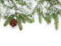 Border from fir twigs, cone and fake snow Royalty Free Stock Photo