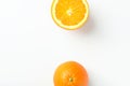 Border frame from ripe juicy organic oranges on white background. Top view flat lay. Vibrant color. Vitamins healthy lifestyle Royalty Free Stock Photo