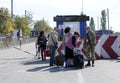 Border guard checking bags of travelers at the border crossing point Kalanchak, Ukrainian-Russian land border
