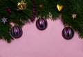 The border is made of pine branches, purple balls, gold stars and bells, paper streamers on a pink background.