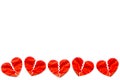 Border of many Red paper broken hearts on white background. Love concept. Divorce.