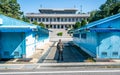 Border between the North and South Korea at the Joint Security Area or Panmunjom with blue huts and demarcation line in DMZ Korea Royalty Free Stock Photo