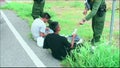 Border patrol agents question suspected illegal border crossers