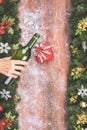 Border pine branches and Christmas ornaments on wood board and s