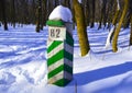 Border post in the forest Royalty Free Stock Photo