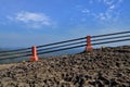 Border rack fence on rock cliff Royalty Free Stock Photo