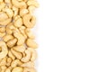 Border of raw, organic, whole cashew nut kernels over white Royalty Free Stock Photo