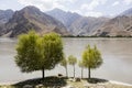 Border river Panj in the Wakhan valley with Tajikistan in the foreground and Afghanistan in the background