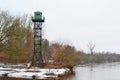 Border tower on the river coast Mukhavets Royalty Free Stock Photo