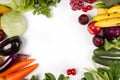 Border various fresh fruits and vegetable on white background