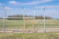 Border fence between Rastina & Bacsszentgyorgy Hungary with a locked gate.