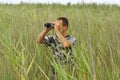 A border war is looking through binoculars Royalty Free Stock Photo