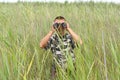 A border war is looking through binoculars