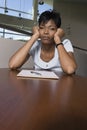 Bored African American Businesswoman At Desk