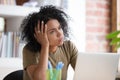 Bored African American businesswoman disinterested in routine work Royalty Free Stock Photo