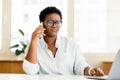 African-American female office employee with smartphone Royalty Free Stock Photo