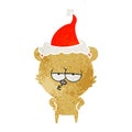 bored bear retro cartoon of a wearing santa hat