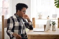 Bored black woman sitting at the desk Royalty Free Stock Photo