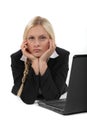 Bored blond office worker Royalty Free Stock Photo