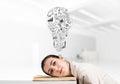 Bored business woman lying on desk