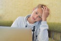 Bored child girl looks at computer. distance learning uninteresting. Royalty Free Stock Photo