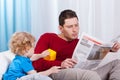 Bored child looking at father Royalty Free Stock Photo