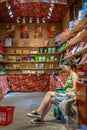 Bored snack seller in Ci Qi Kou Old town in Chongqing