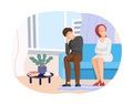 Bored couple sitting on sofa in living room