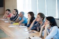 Bored creative business team attending a meeting Royalty Free Stock Photo